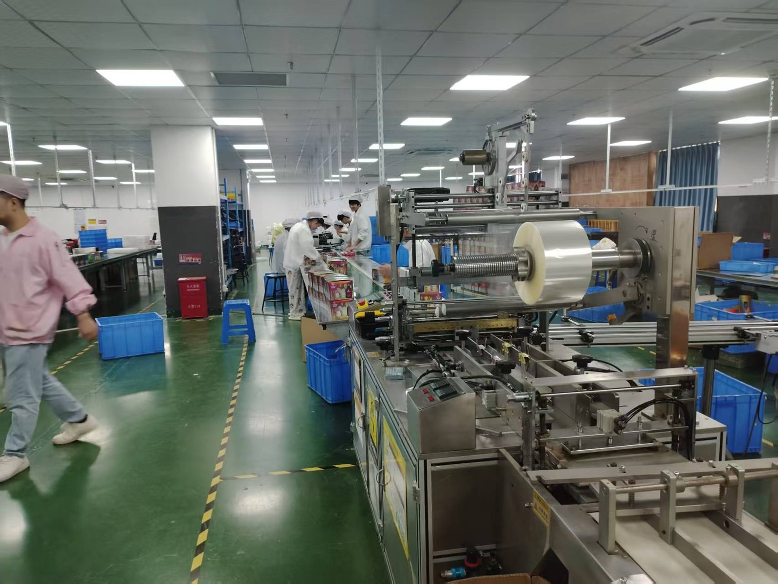 Vape factory production area viewed through glass partition